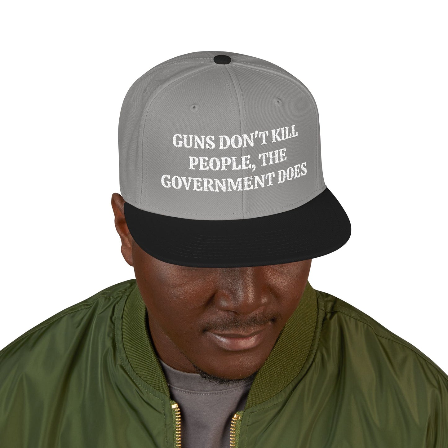 GUNS DON'T KILL PEOPLE, THE GOVERNMENT DOES "MAGA" EMBROIDERED HAT